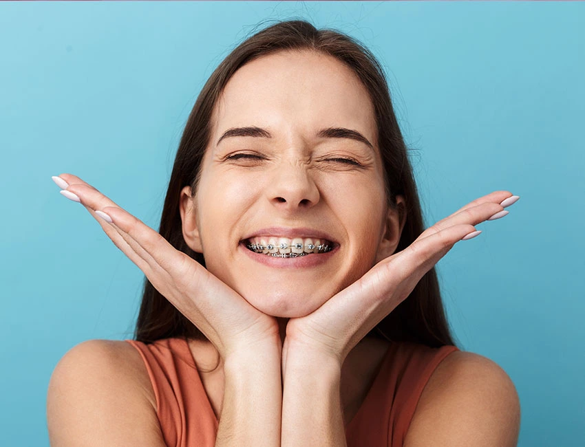 Happy patient with braces in Agoura Hills, CA