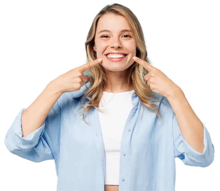 A teenager holding an Invisalign Teen aligner at The Smile Spa