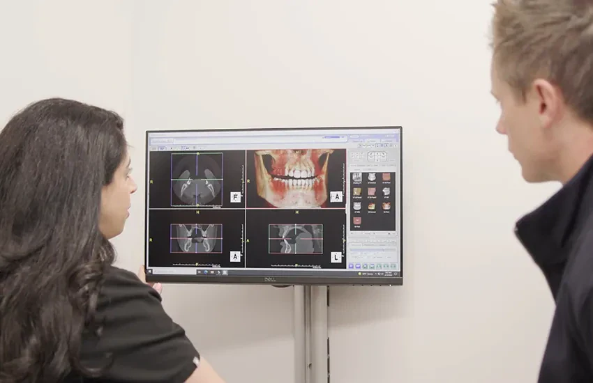 Reviewing digital X-rays during a treatment-planning consultation
